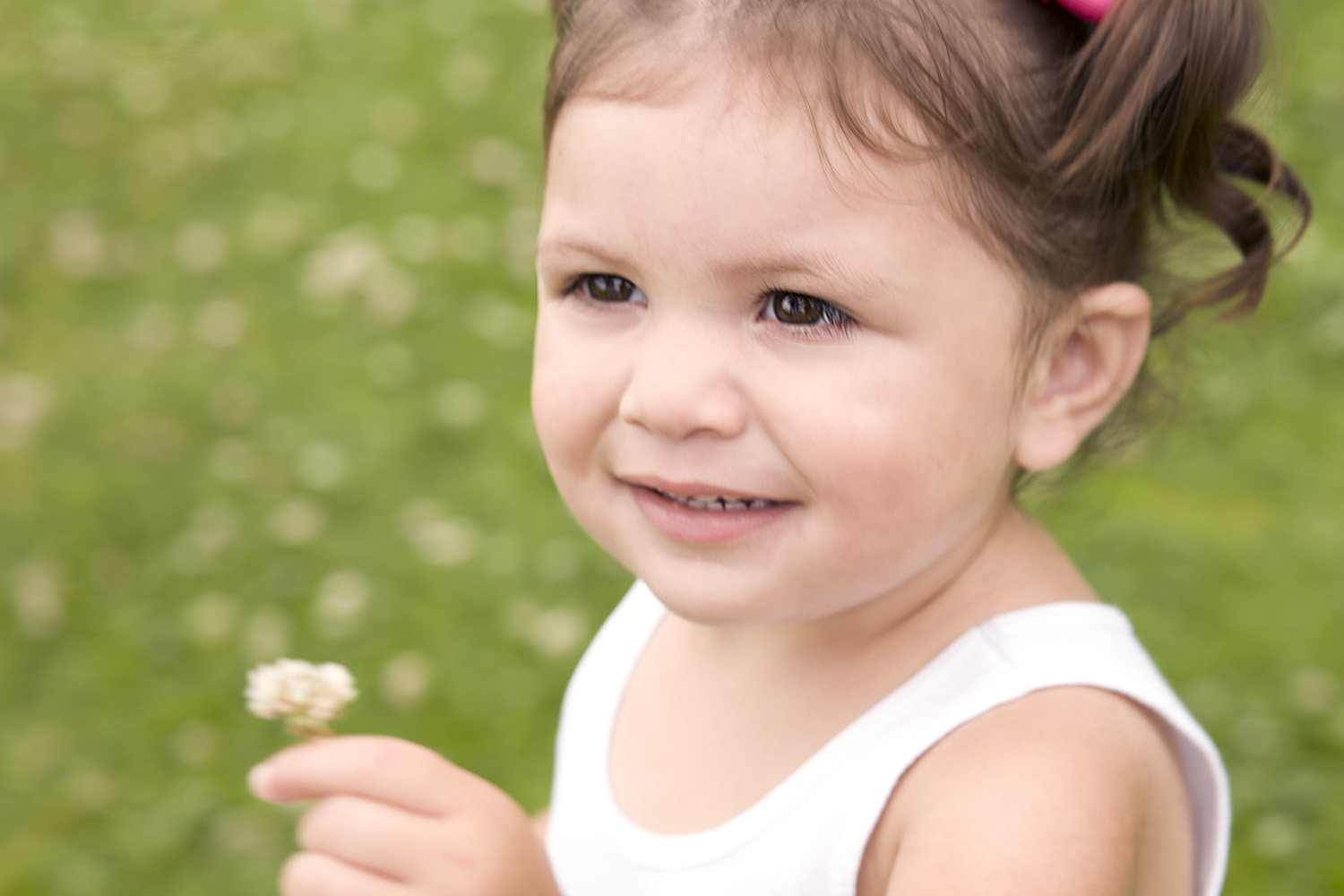 Little girl portrait in grass