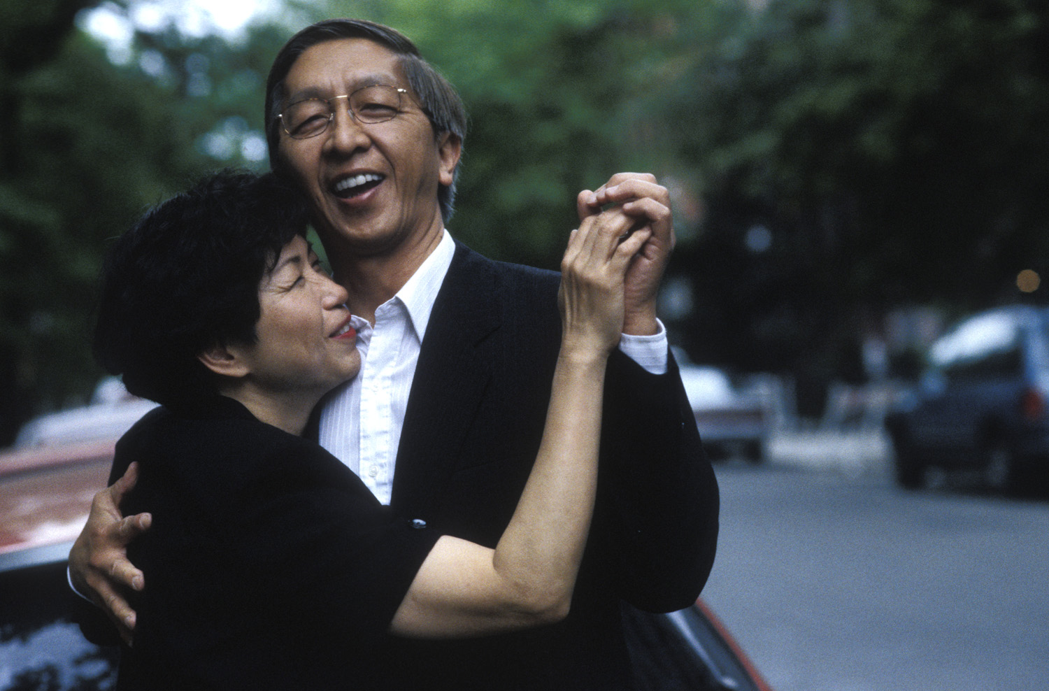 Parents dancing in Los Angeles street