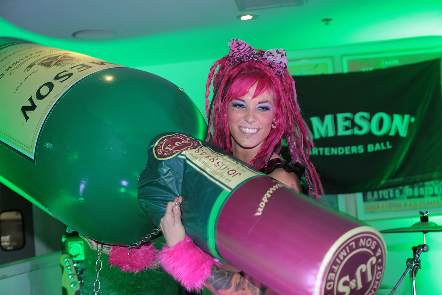 Brand activation event photography with Jameson promotional display